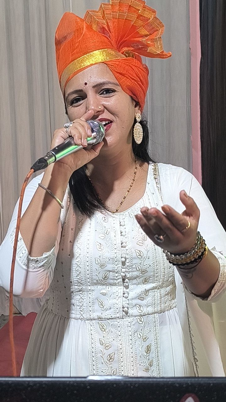 Priya performing in traditional attire
